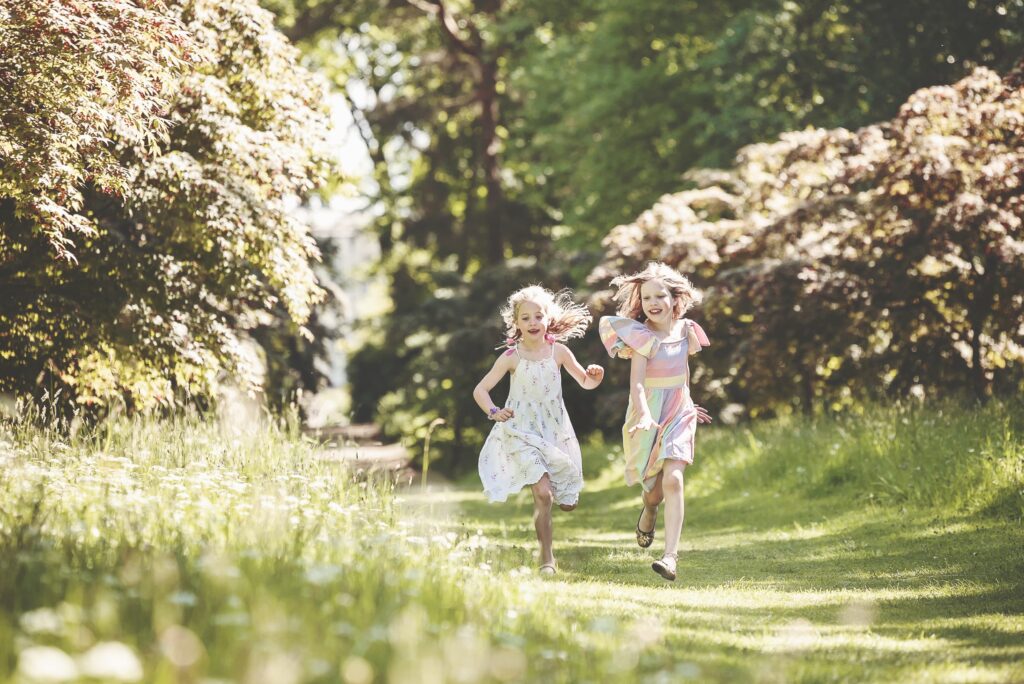 Children running in the Arboretum